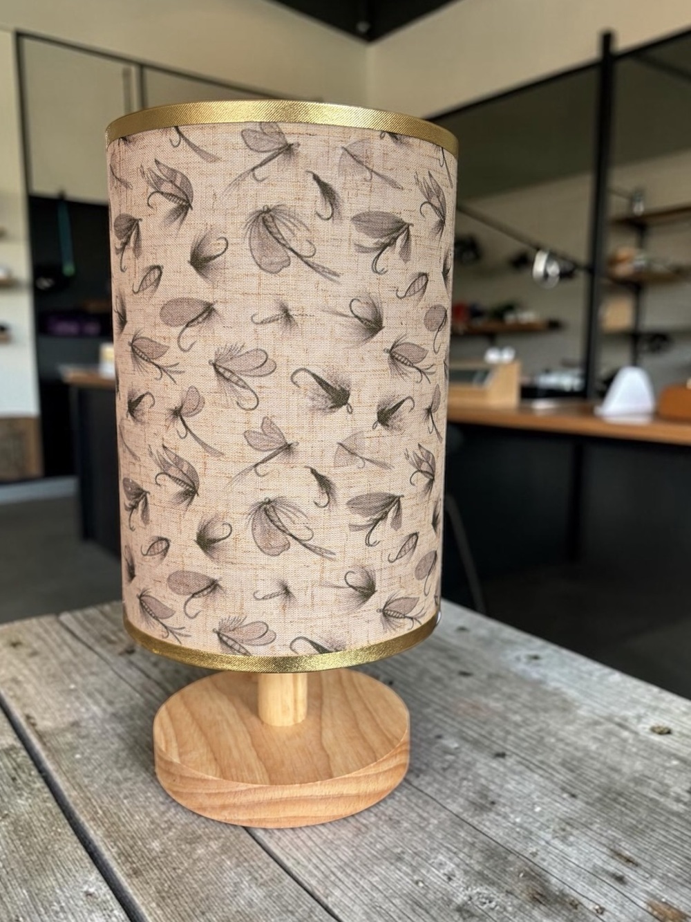 Fly Fishing Flies Lures Print Cylinder Table Lamp in Beige with Gold Trim